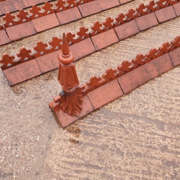 Double Crested Clay ridge tiles and finial